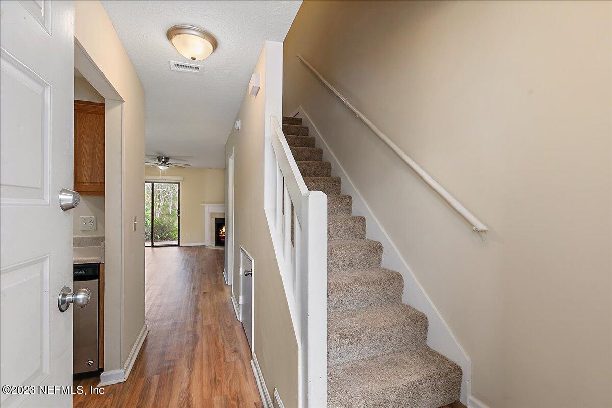 3801 Crown Point Road, Unit 1184 Jacksonville, FL 32257 - Photo 3 of 19 03-Foyer and Stairs