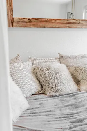 a view of a way to room with furniture and windows