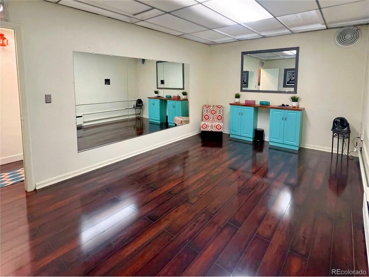 536 Cherokee Street Denver, CO 80204 - Photo 34 of 37 a living room with furniture and a wooden floor
