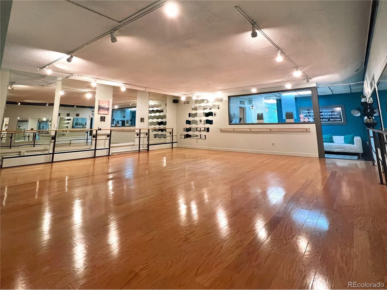 536 Cherokee Street Denver, CO 80204 - Photo 37 of 37 a view of an empty room with wooden floor