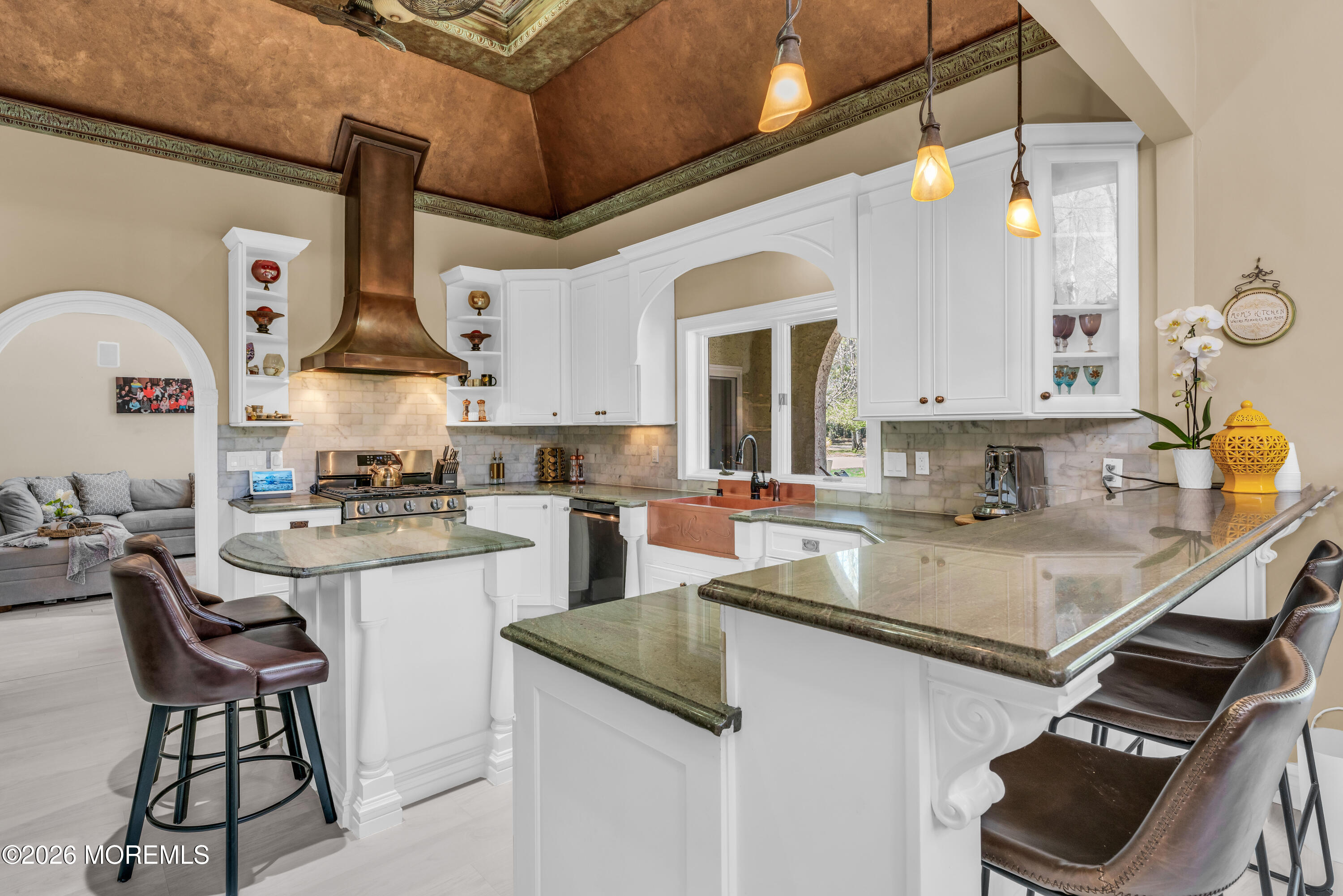 12 Red Fox Run Manalapan, NJ 07726 - Photo 11 of 57 a kitchen with a sink stainless steel appliances and cabinets