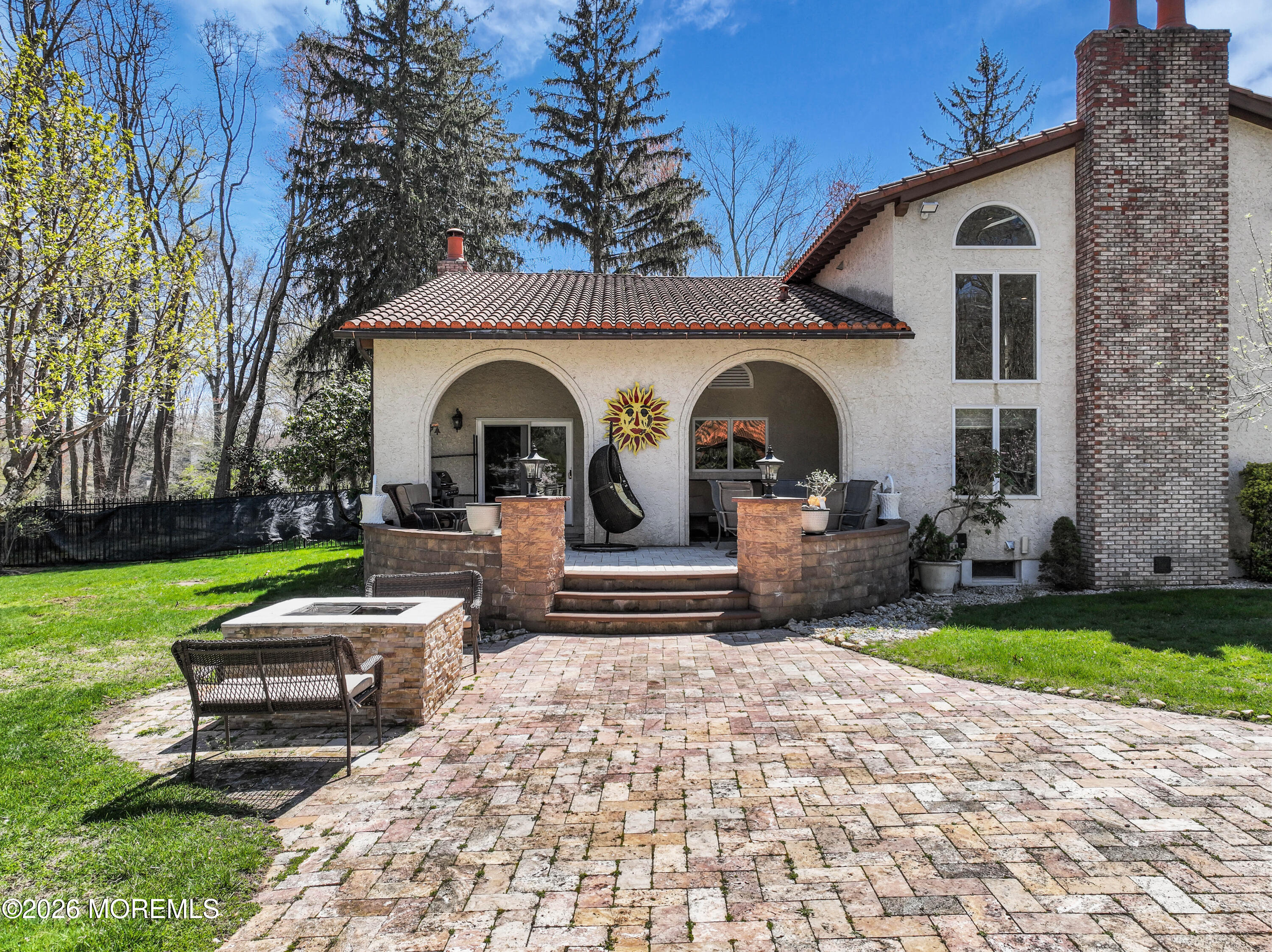 12 Red Fox Run Manalapan, NJ 07726 - Photo 43 of 57 a front view of a house with garden