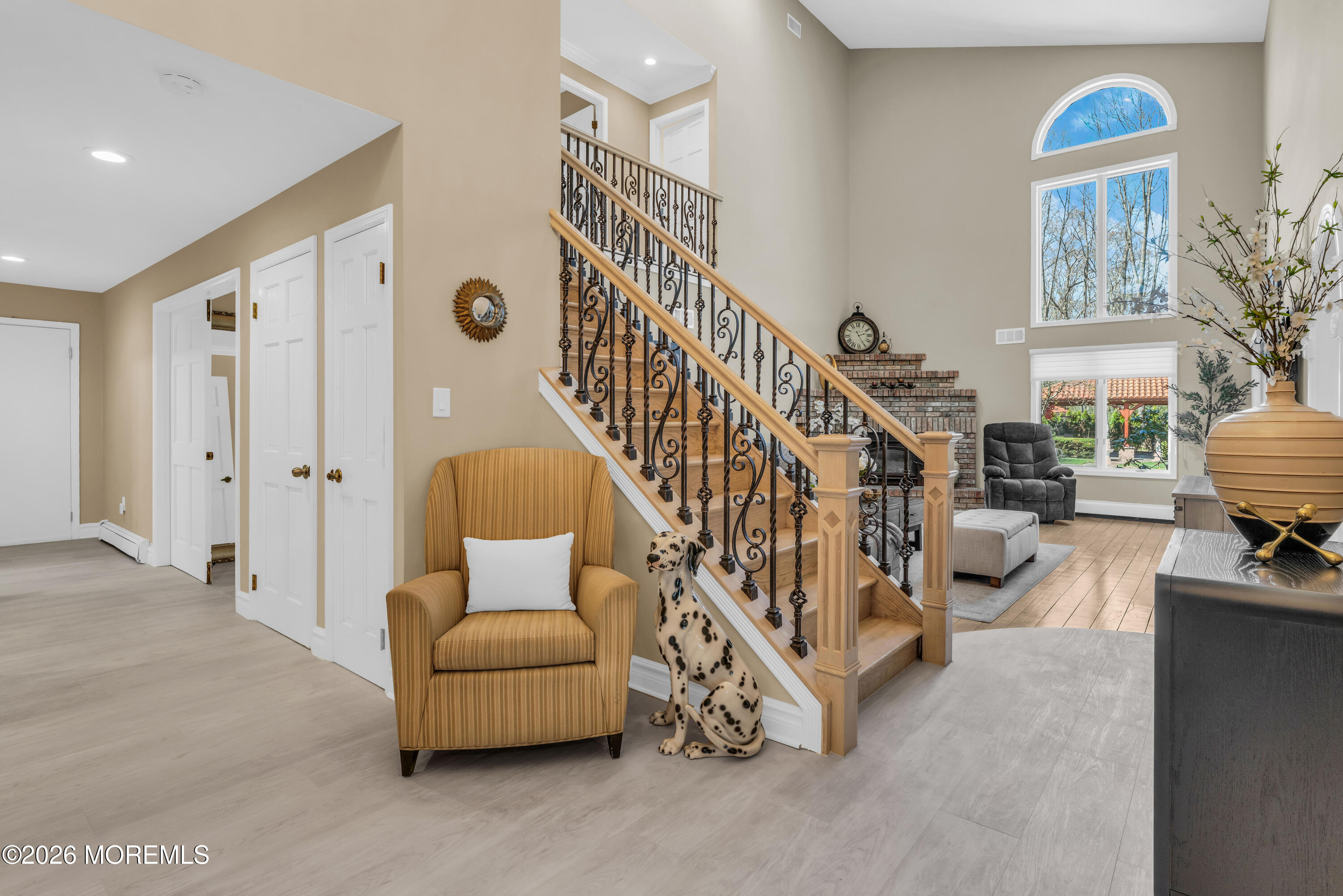 12 Red Fox Run Manalapan, NJ 07726 - Photo 6 of 57 a living room with furniture and stairs