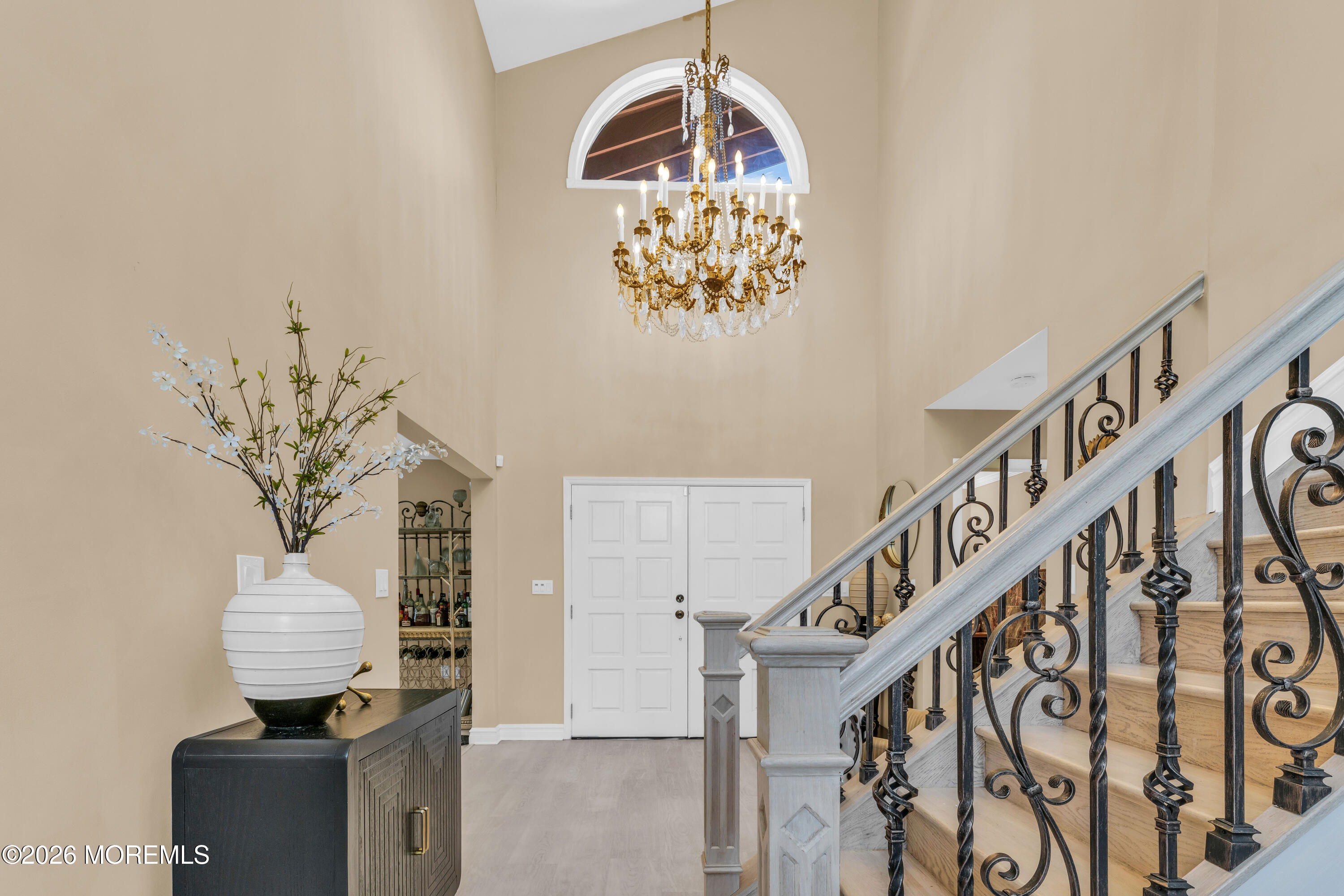 12 Red Fox Run Manalapan, NJ 07726 - Photo 7 of 57 a view of entryway with wooden floor