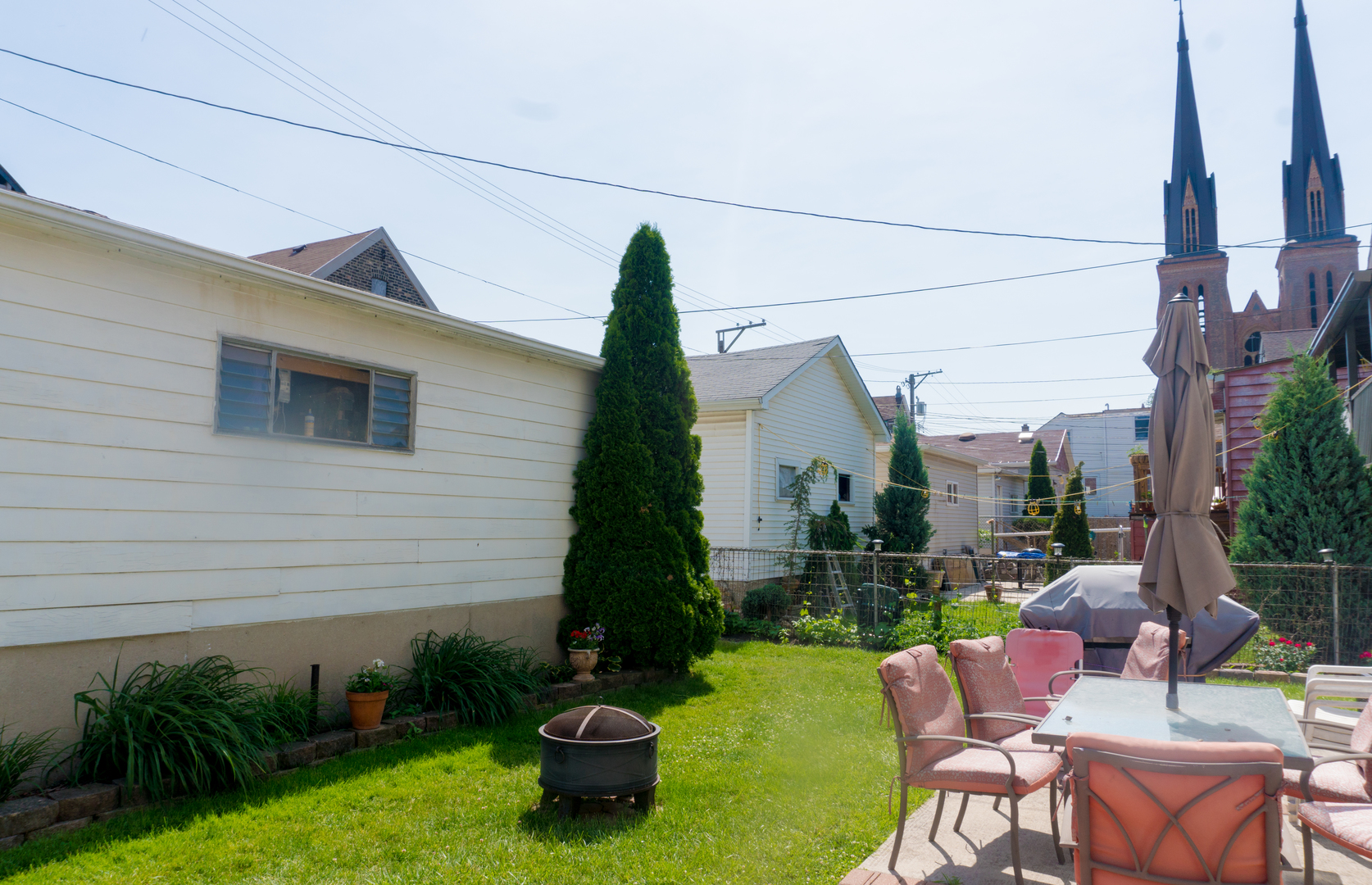 2027 West 22nd Place, Unit 3 Chicago, IL 60608 - Photo 14 of 16 a view of backyard with outdoor seating and plants