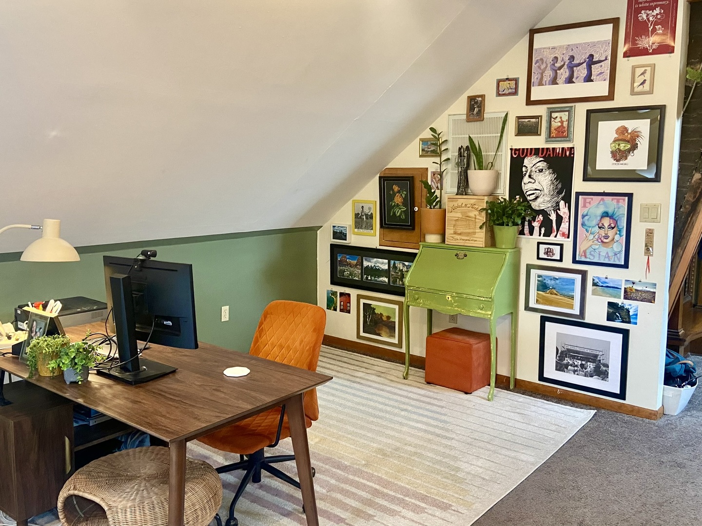 2027 West 22nd Place, Unit 3 Chicago, IL 60608 - Photo 4 of 16 a workspace with furniture and painting on the wall