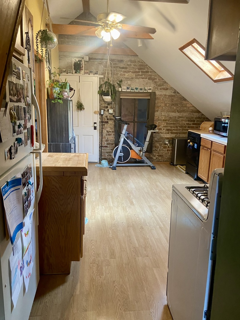 2027 West 22nd Place, Unit 3 Chicago, IL 60608 - Photo 6 of 16 a view of a storage with utility room