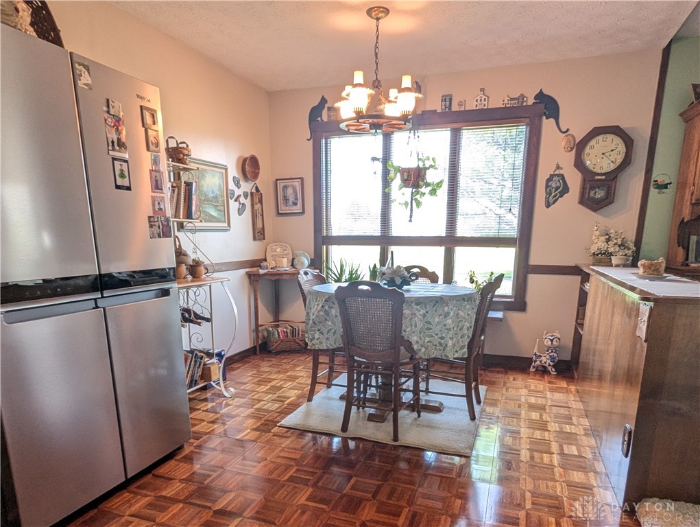 8713 Oakes Road Arcanum, OH 45304 - Photo 16 of 29 This kitchen showcases a functional layout and ample natural light, ideal for everyday living.