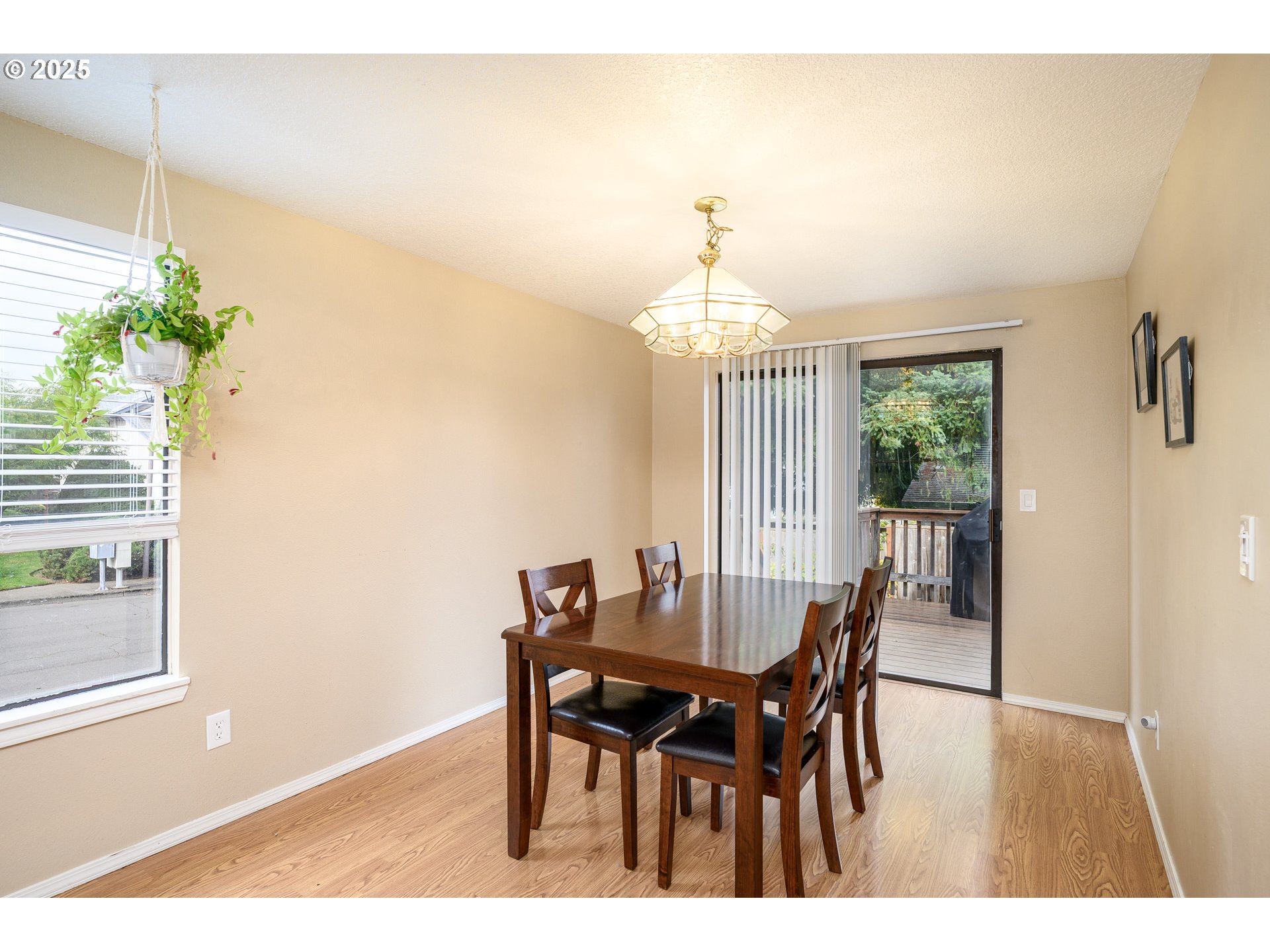 13675 Southwest Feiring Lane Tigard, OR 97223 - Photo 13 of 43 a view of a dining room with furniture and a window