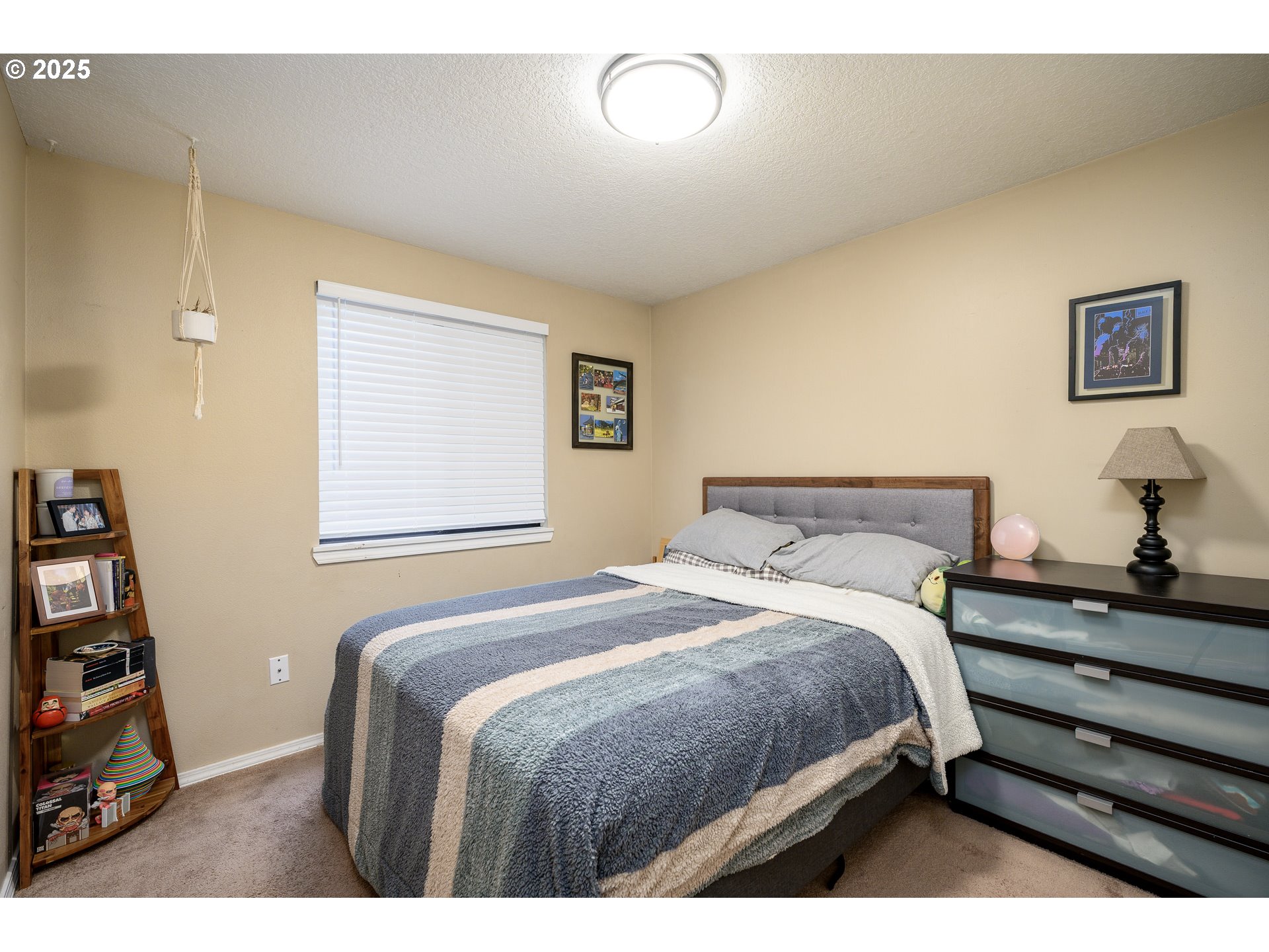 13675 Southwest Feiring Lane Tigard, OR 97223 - Photo 22 of 43 a bedroom with a bed and a window
