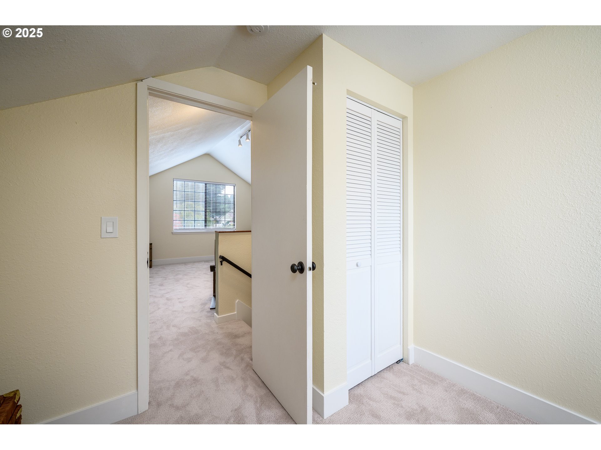13675 Southwest Feiring Lane Tigard, OR 97223 - Photo 31 of 43 a view of a hallway with wooden floor and staircase