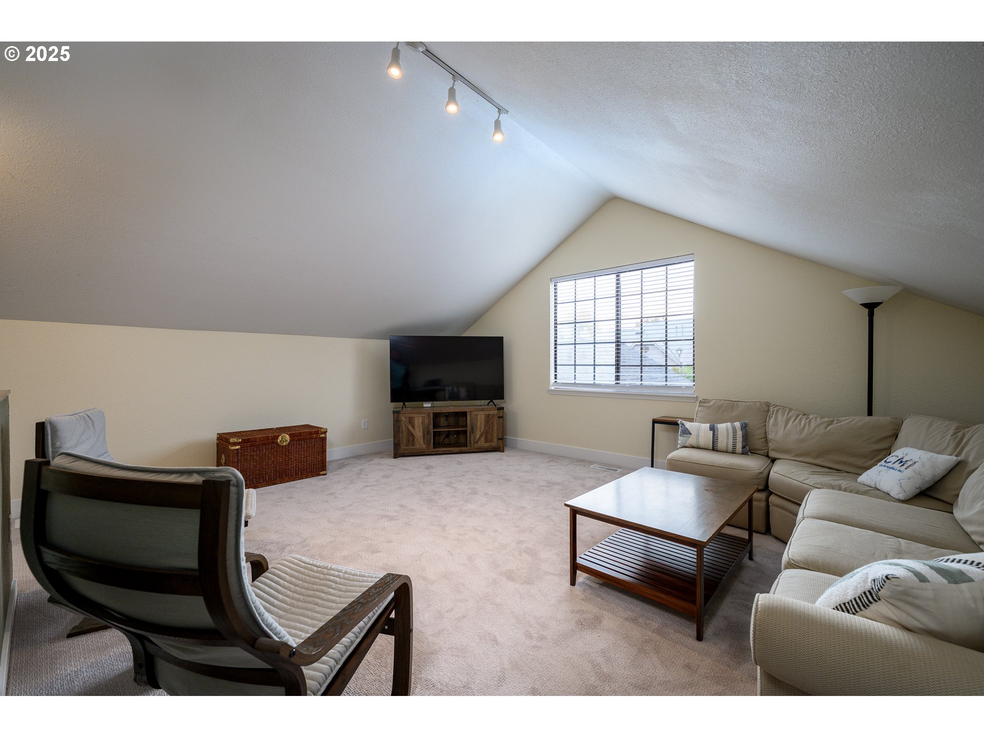 13675 Southwest Feiring Lane Tigard, OR 97223 - Photo 34 of 43 a living room with furniture and a window