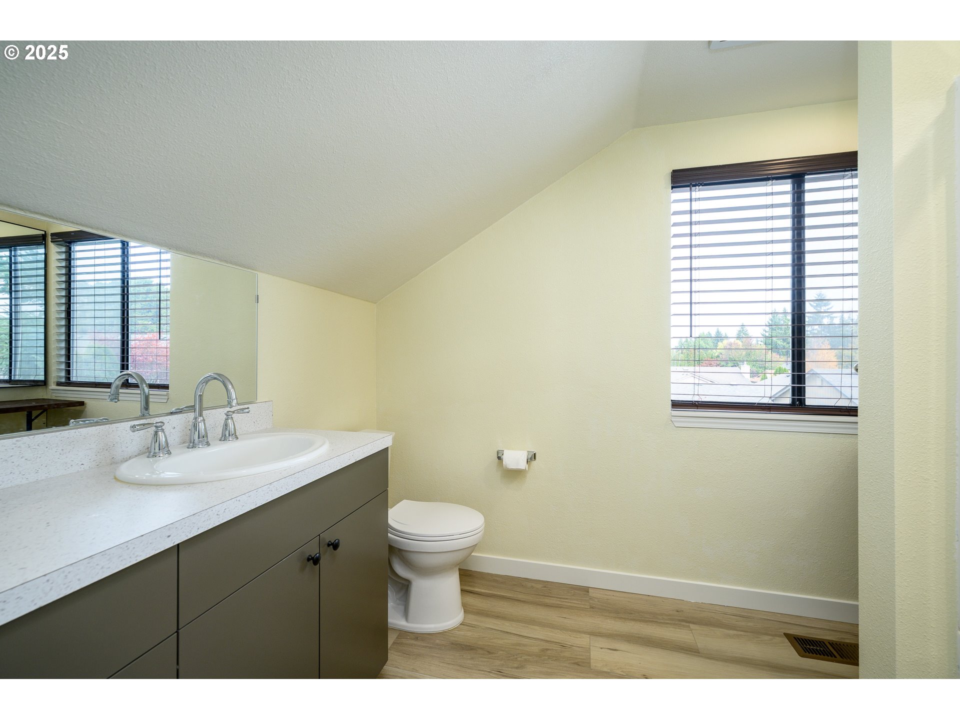13675 Southwest Feiring Lane Tigard, OR 97223 - Photo 36 of 43 a bathroom with a sink toilet and a mirror