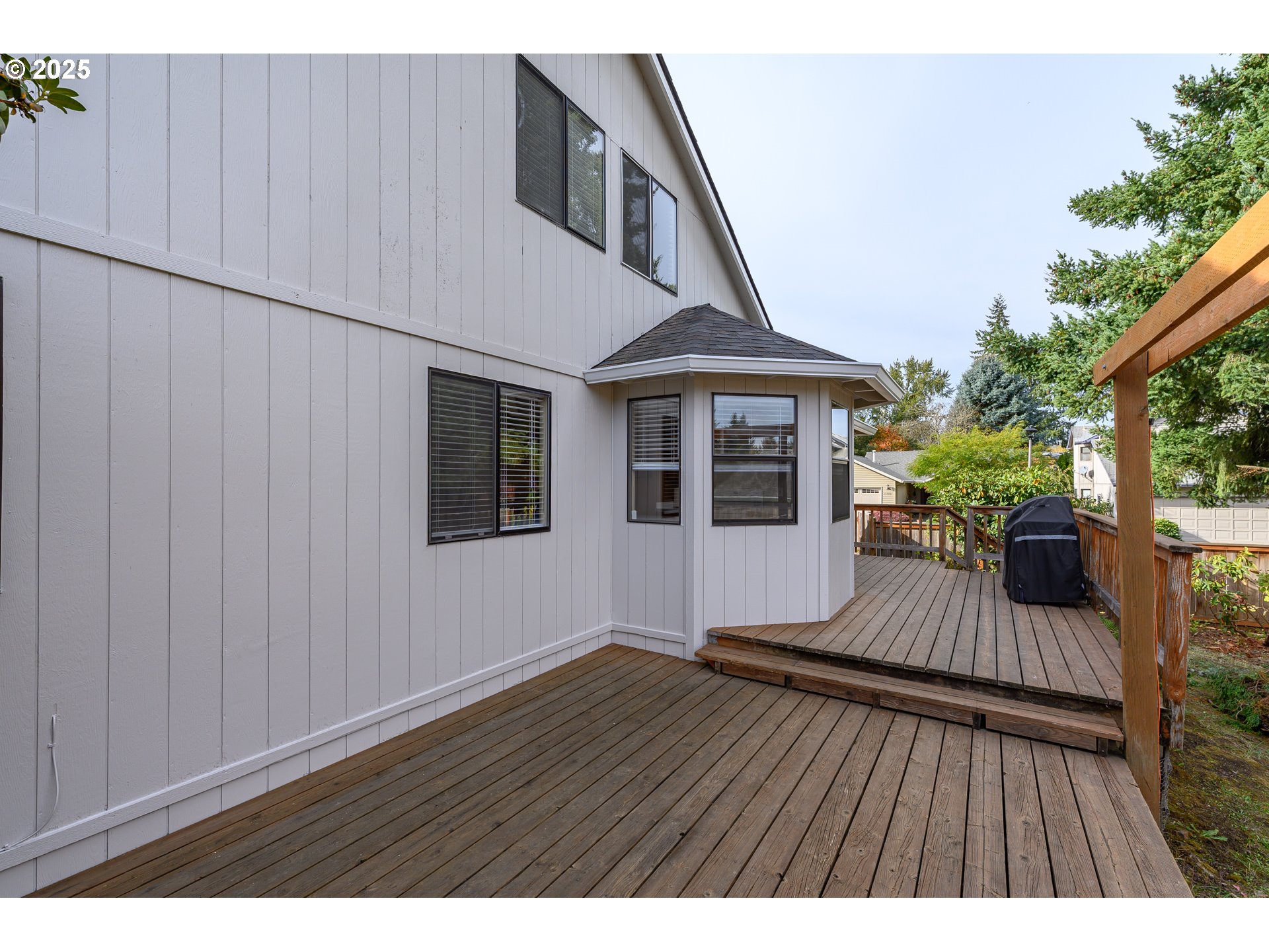 13675 Southwest Feiring Lane Tigard, OR 97223 - Photo 43 of 43 a view of backyard with a deck and wooden floor