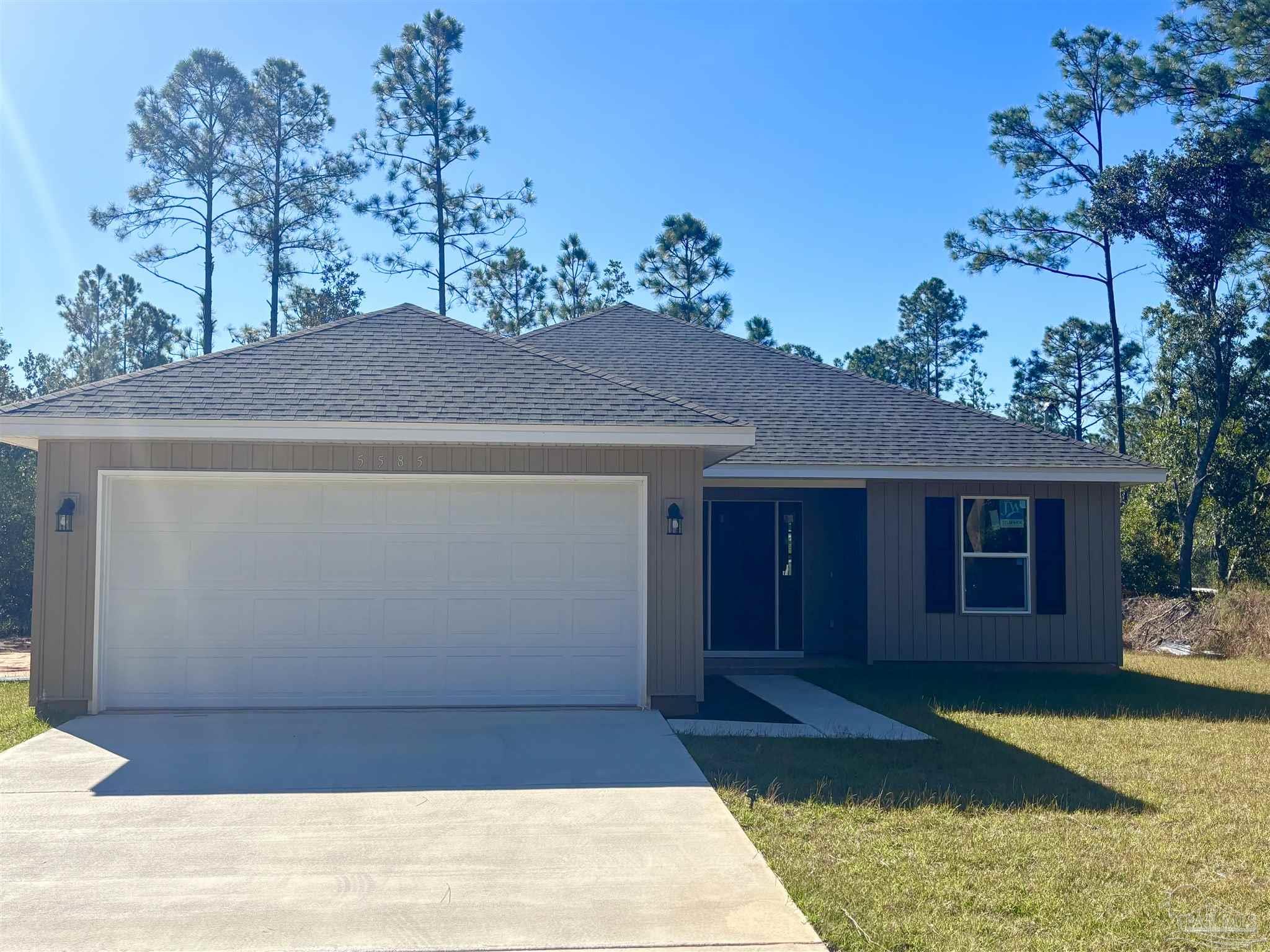 a house view with a garden space