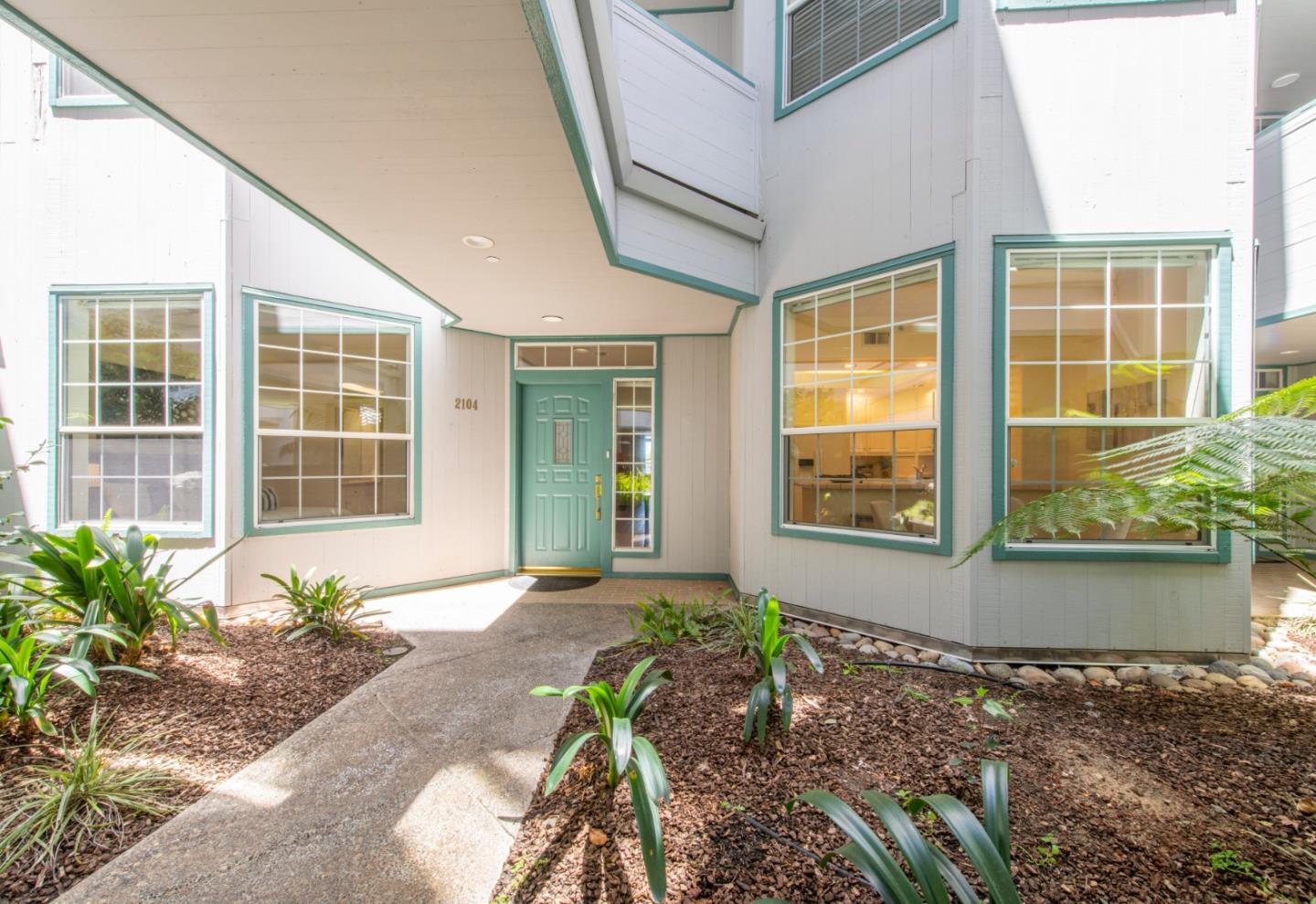 720 Promontory Point Lane, Unit 2104 Foster City, CA 94404 - Photo 1 of 27 a front view of a house