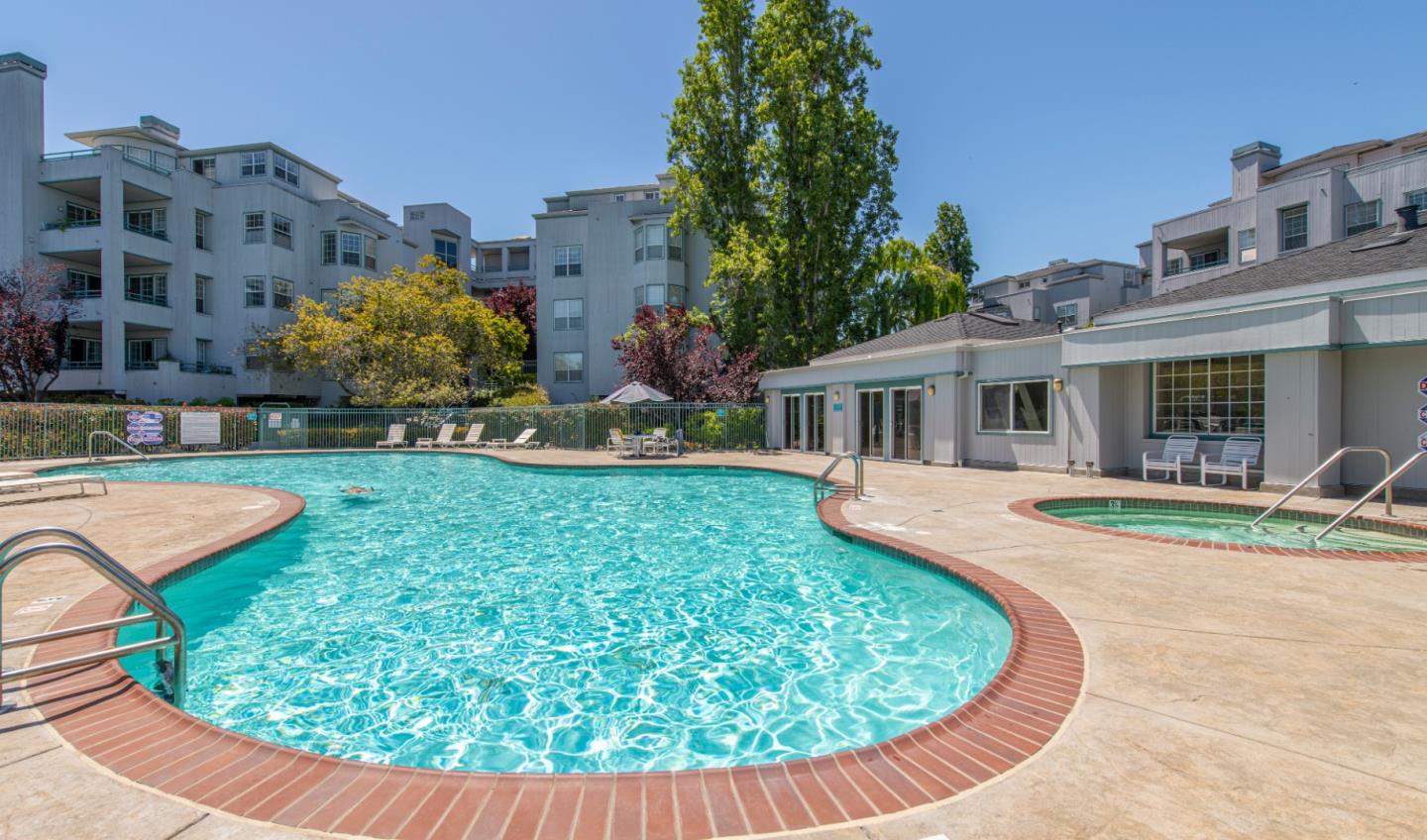 720 Promontory Point Lane, Unit 2104 Foster City, CA 94404 - Photo 26 of 27 front view of a house with a swimming pool