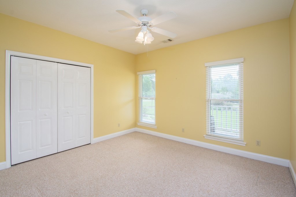 885 Jenkins Road, Unit 14 Forsyth, GA 31029 - Photo 22 of 33 a view of an empty room with a window