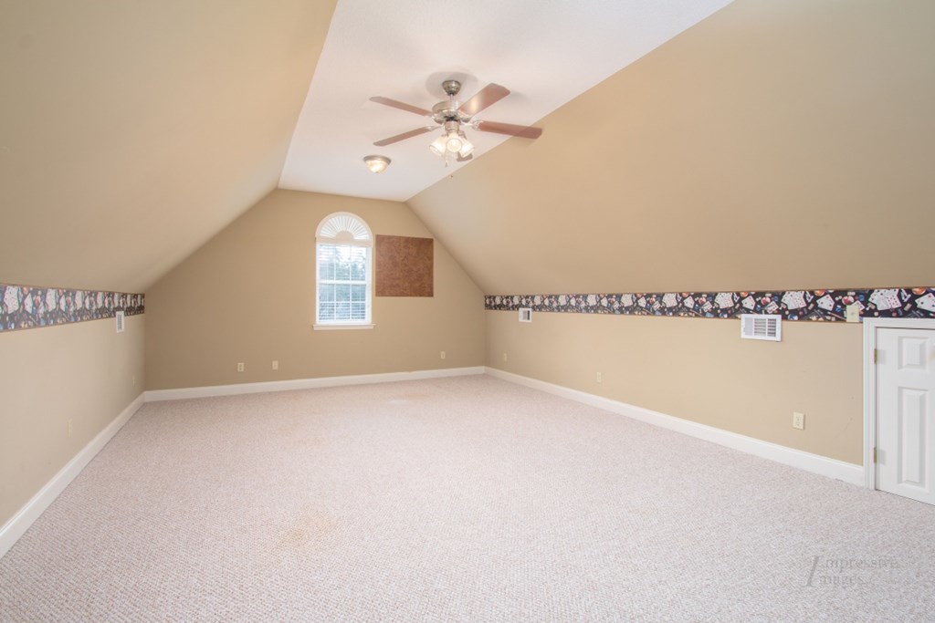885 Jenkins Road, Unit 14 Forsyth, GA 31029 - Photo 24 of 33 a view of an empty room with a window