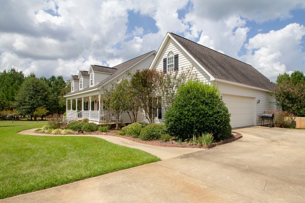 885 Jenkins Road, Unit 14 Forsyth, GA 31029 - Photo 26 of 33 a front view of a house with a yard