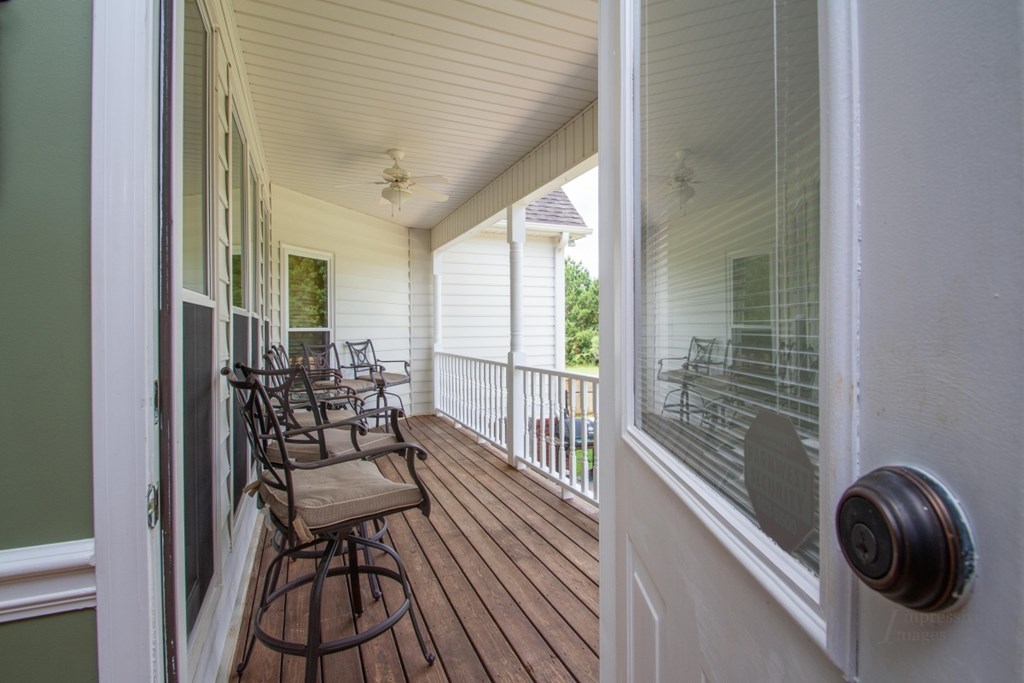 885 Jenkins Road, Unit 14 Forsyth, GA 31029 - Photo 27 of 33 a view of a porch with chairs and furniture