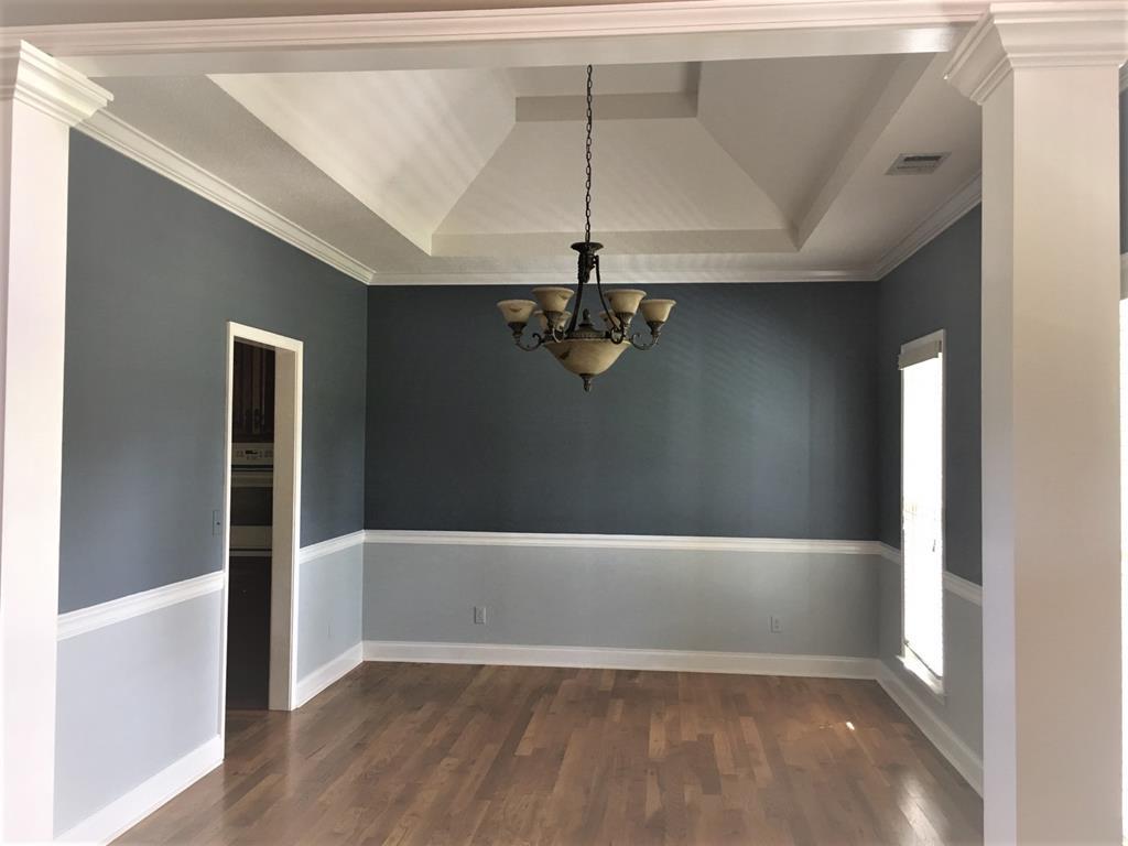 885 Jenkins Road, Unit 14 Forsyth, GA 31029 - Photo 33 of 33 an empty room with wooden floor