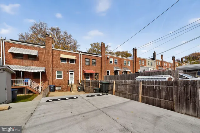 a city street lined with tall buildings