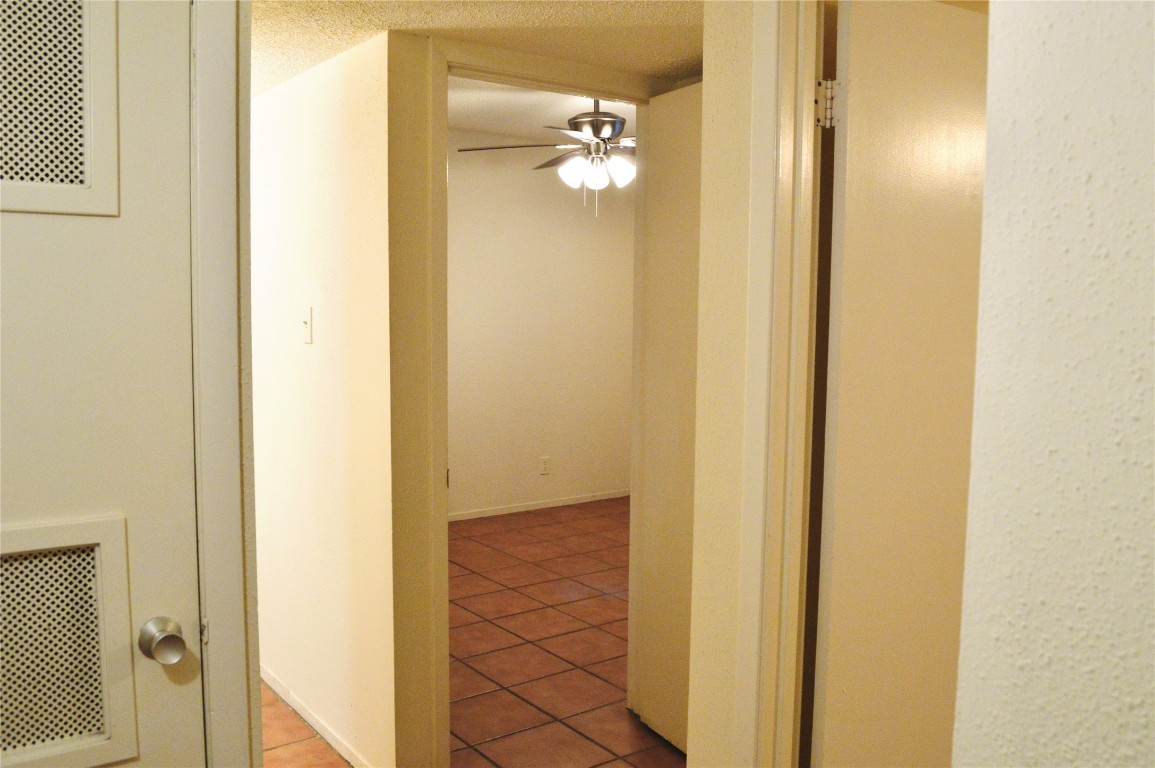 2610 Salado Street, Unit 110 Austin, TX 78705 - Photo 13 of 20 a view of a hallway with a closet
