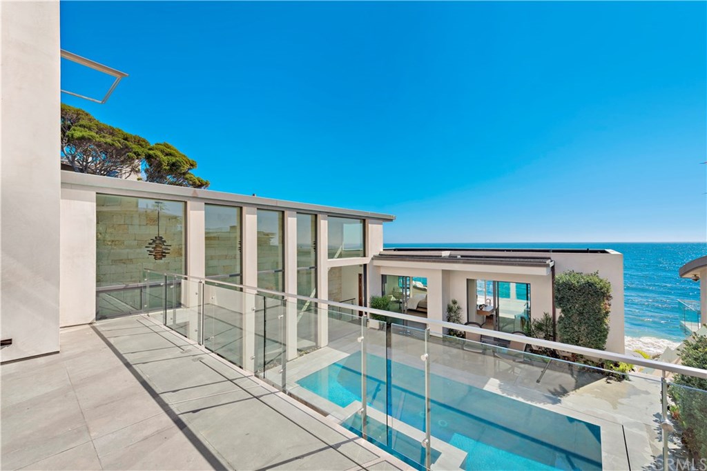 992 Ocean Front Laguna Beach, CA 92651 - Photo 1 of 33 Top level view deck outside of guest bedrooms.