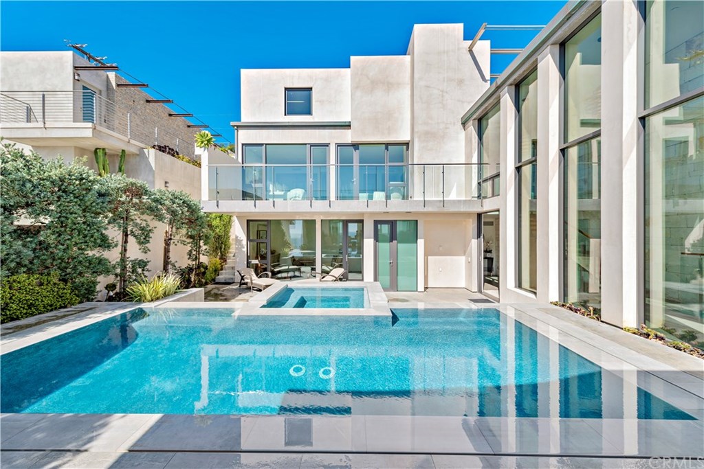 992 Ocean Front Laguna Beach, CA 92651 - Photo 2 of 33 Courtyard pool. Guest bedrooms above, home office below.