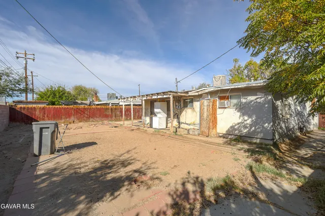 a view of a house with wooden floor and roof