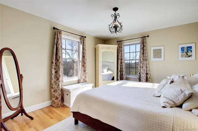 a bathroom with a granite countertop sink a toilet and bathtub