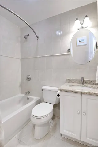 a view of a dining room with furniture and a livingroom