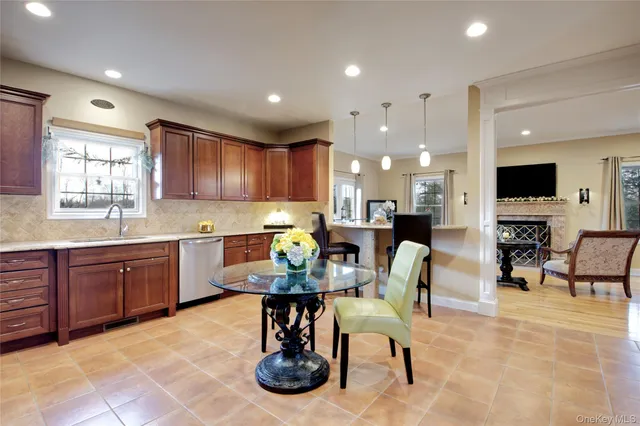 a kitchen with refrigerator and cabinets
