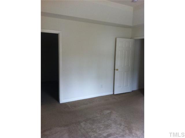 910 Ujamaa Drive Raleigh, NC 27610 - Photo 4 of 6 a view of an empty room