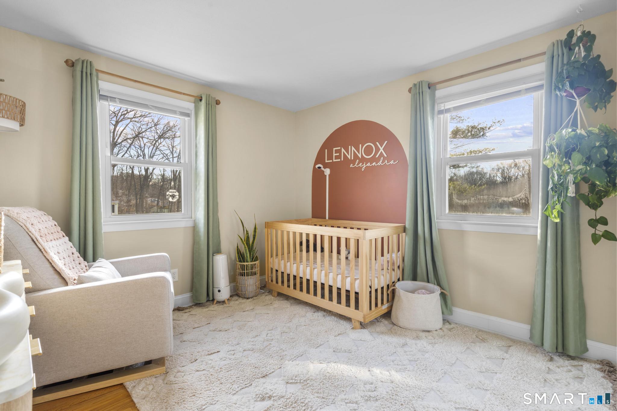 97 Racebrook Road Meriden, CT 06451 - Photo 12 of 35 a bedroom with a couch and a window