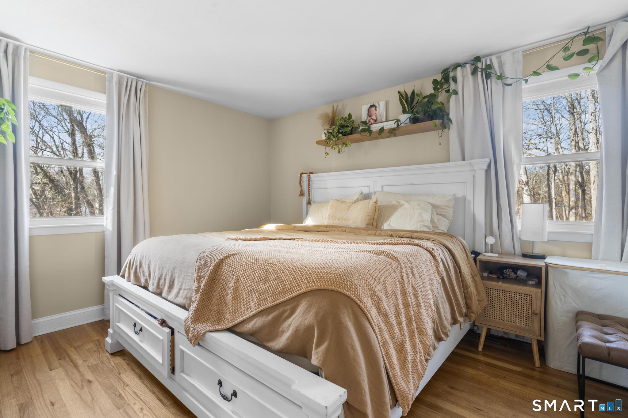 97 Racebrook Road Meriden, CT 06451 - Photo 14 of 35 a bedroom with a bed and a window