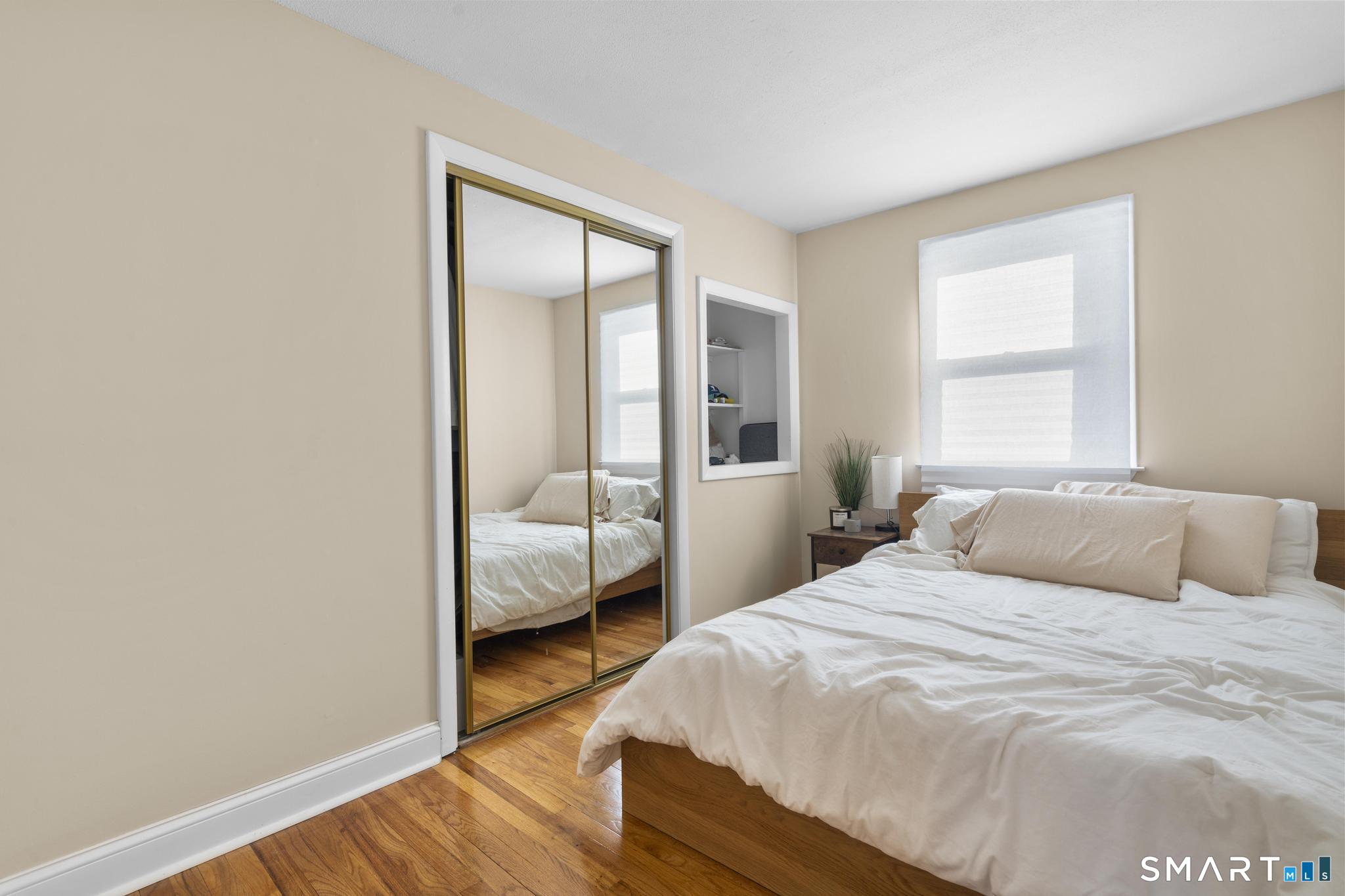 97 Racebrook Road Meriden, CT 06451 - Photo 16 of 35 a bedroom with a bed and a window