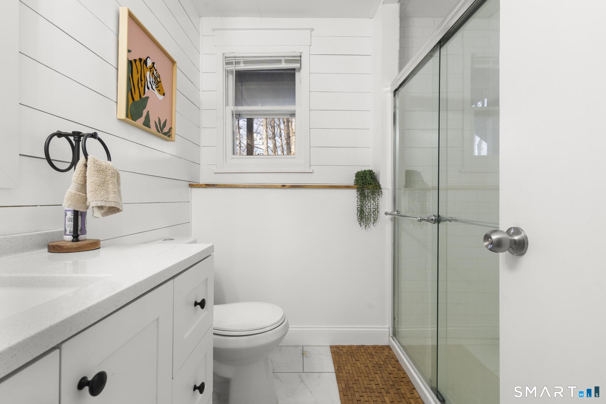 97 Racebrook Road Meriden, CT 06451 - Photo 21 of 35 a bathroom with a sink a toilet and shower