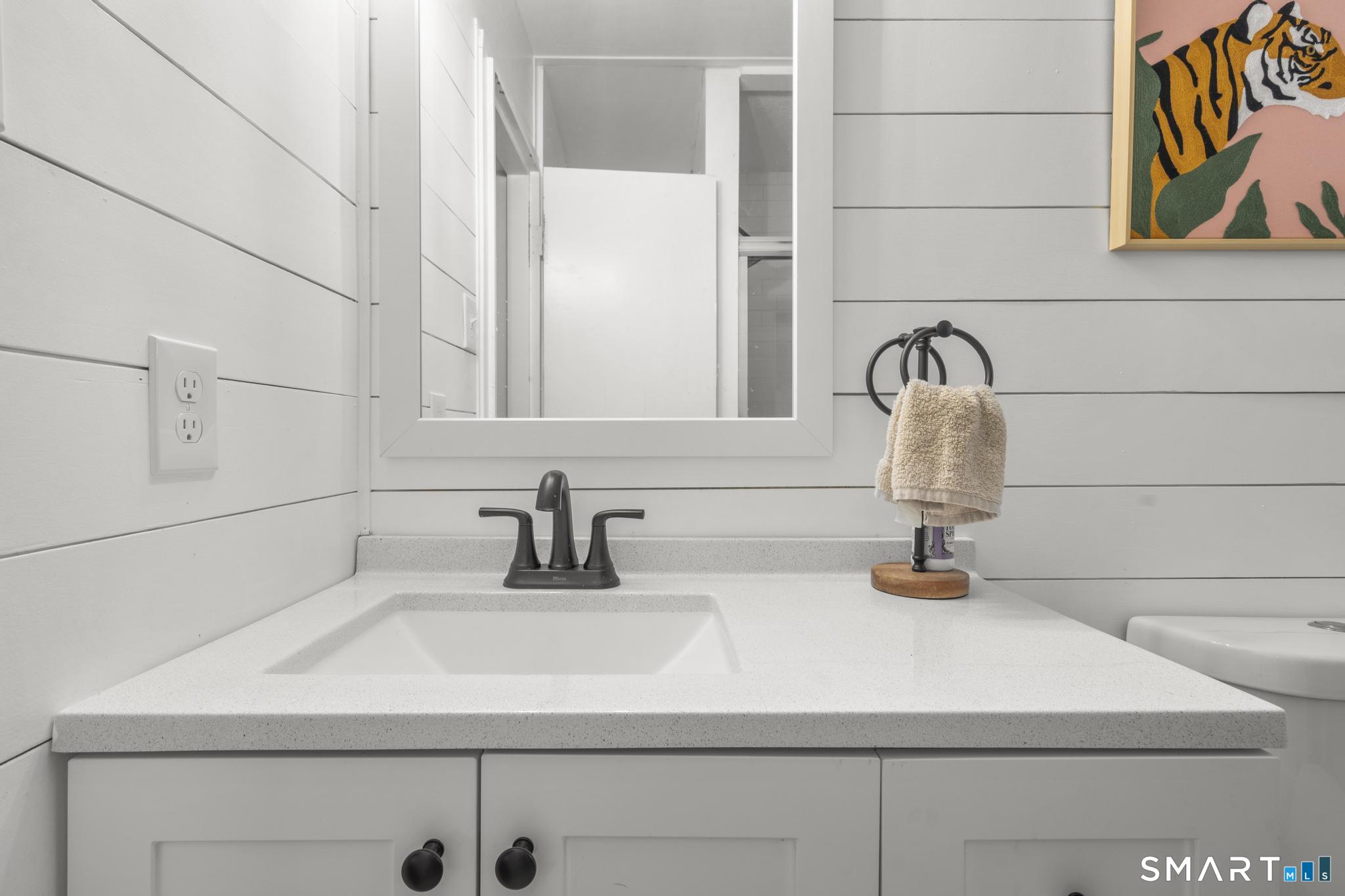 97 Racebrook Road Meriden, CT 06451 - Photo 22 of 35 a bathroom with a sink and a window