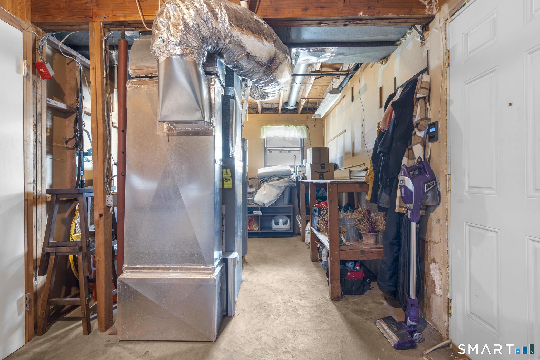 97 Racebrook Road Meriden, CT 06451 - Photo 24 of 35 a view of walk in closet with clothes and shoes