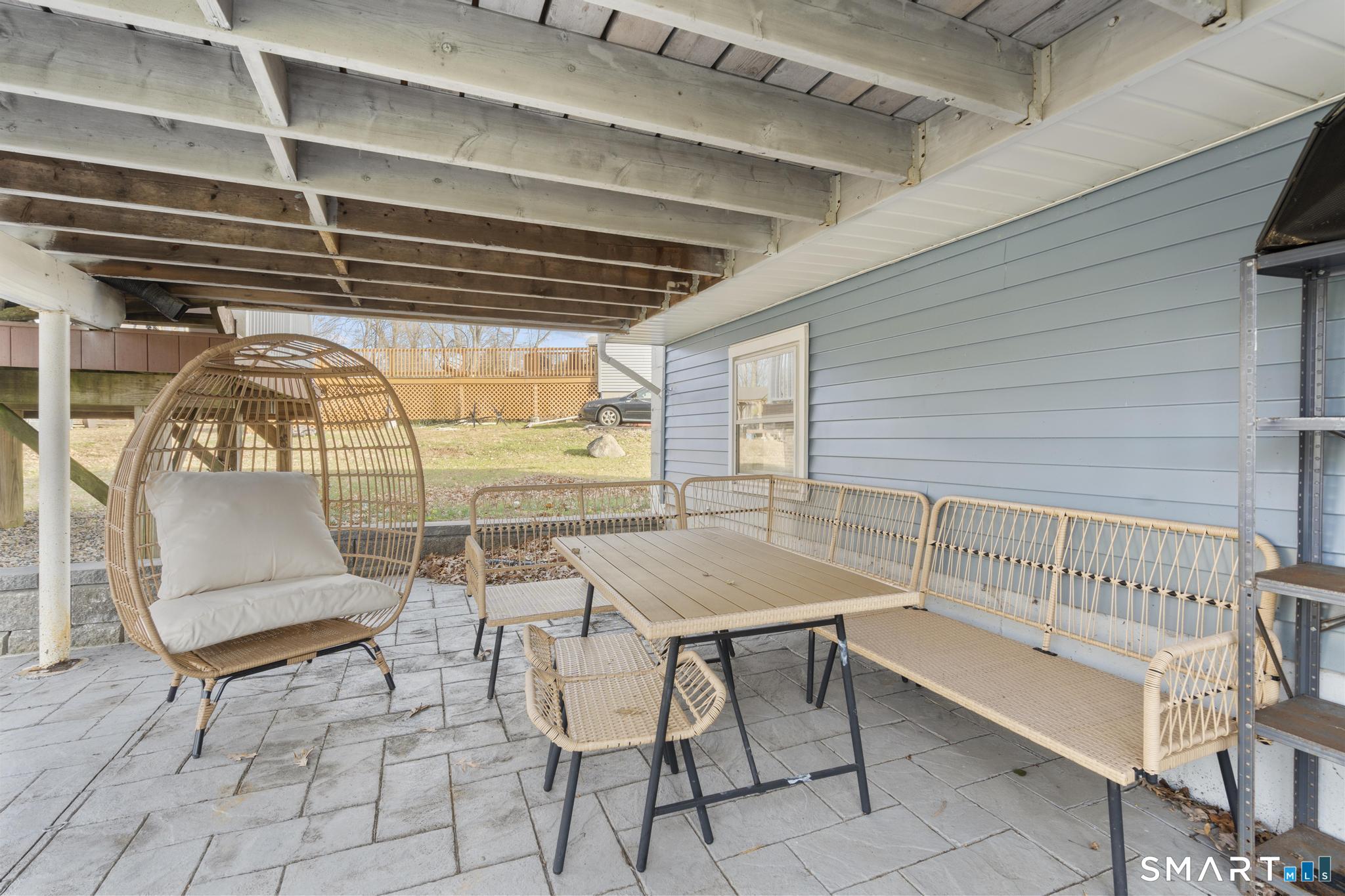 97 Racebrook Road Meriden, CT 06451 - Photo 30 of 35 a roof deck with table and chairs