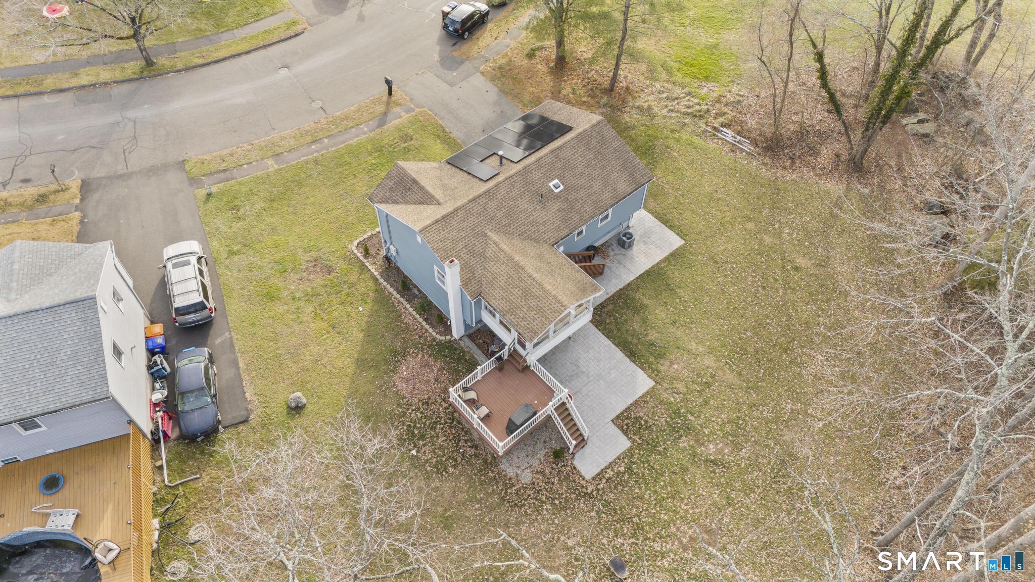 97 Racebrook Road Meriden, CT 06451 - Photo 3 of 35 an aerial view of a backyard with wooden floor