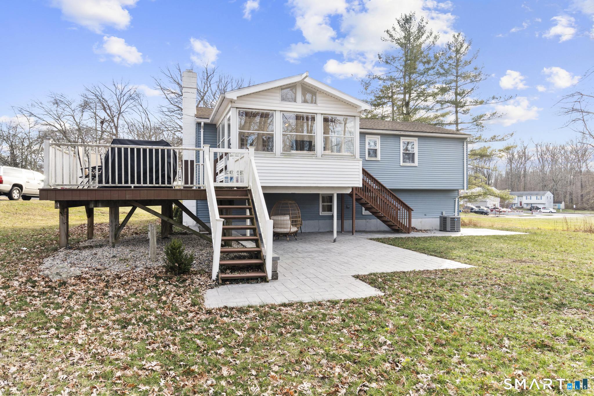 97 Racebrook Road Meriden, CT 06451 - Photo 31 of 35 a front view of a house with a yard table and chairs