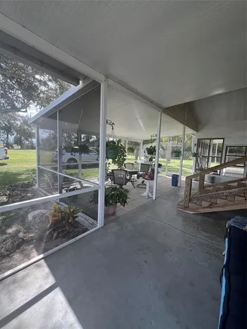 a room with lots of table and chairs