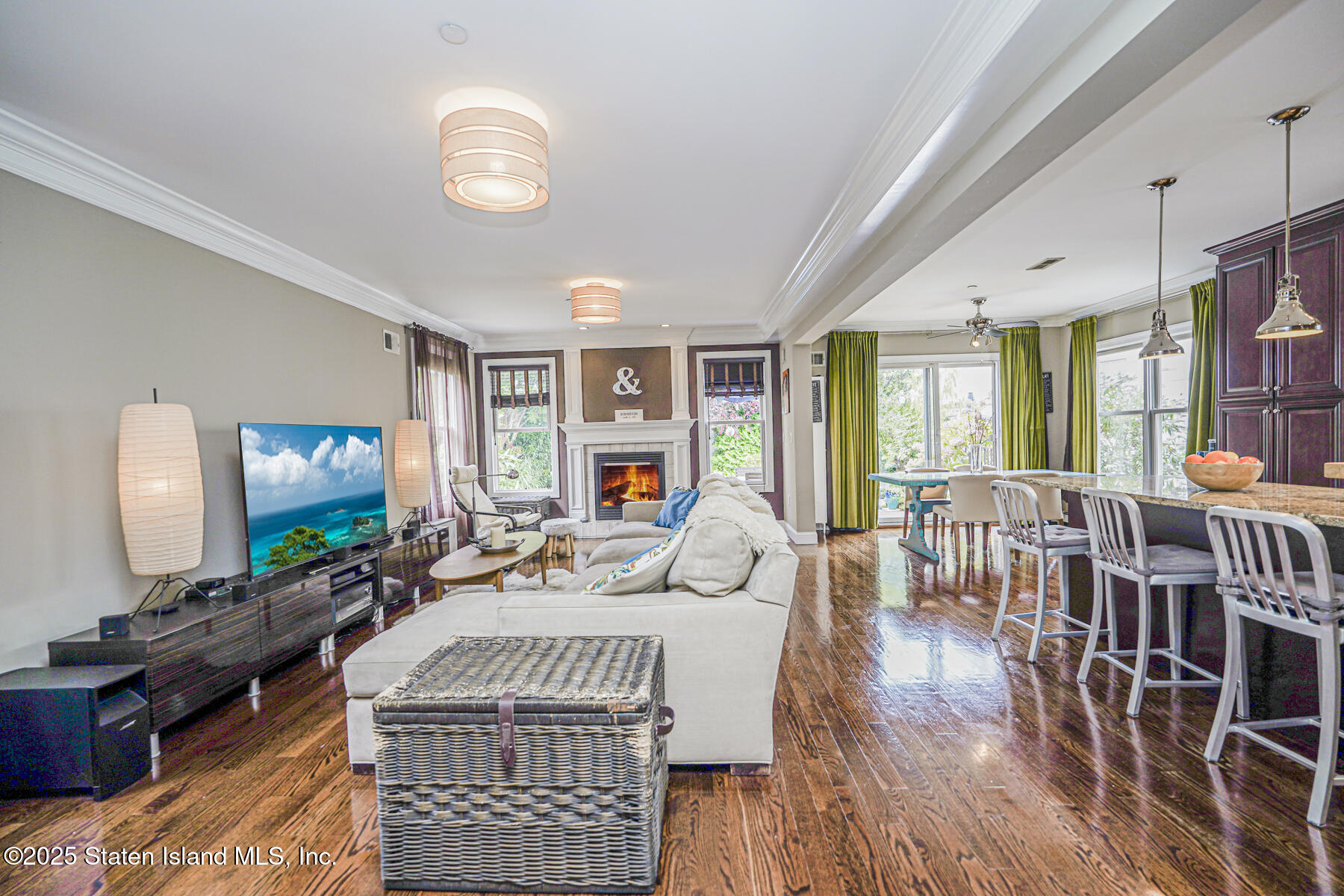 28 Brookside Loop Staten Island, NY 10309 - Photo 15 of 60 a living room with furniture a flat screen tv and wooden floor