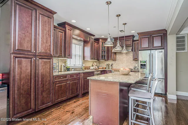 a bedroom with a bed table and a window