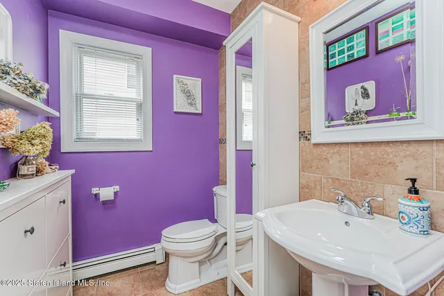 a living room with furniture or couch and a bookshelf