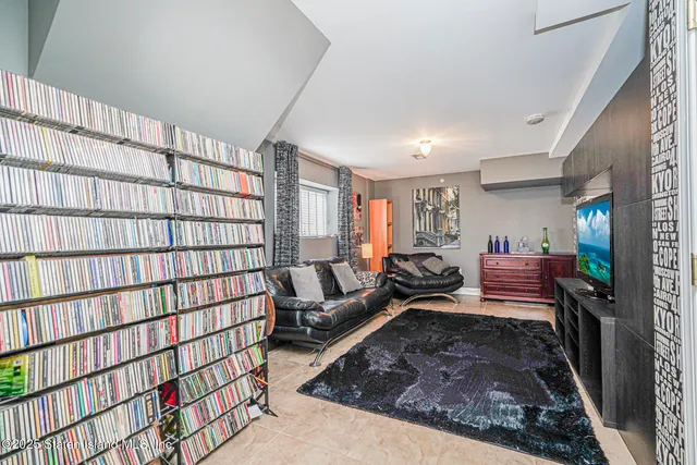 a view of a livingroom with furniture and wooden floor