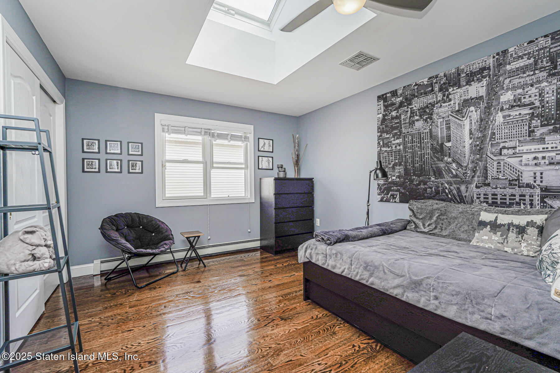 28 Brookside Loop Staten Island, NY 10309 - Photo 33 of 60 a bedroom with a bed and window